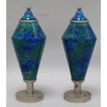 A pair of Paul Milet Sevres Art Deco pottery and chrome electroplate mounted vases and integral