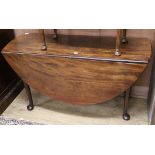 A George III mahogany oval topped leaf dining table W.138cm