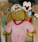 A Mickey Mouse toy and two others