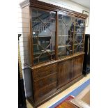 A George III style mahogany bookcase W.210cm