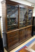 A George III style mahogany bookcase W.210cm