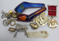 A silver gilt medallion, cased pipe and other items.