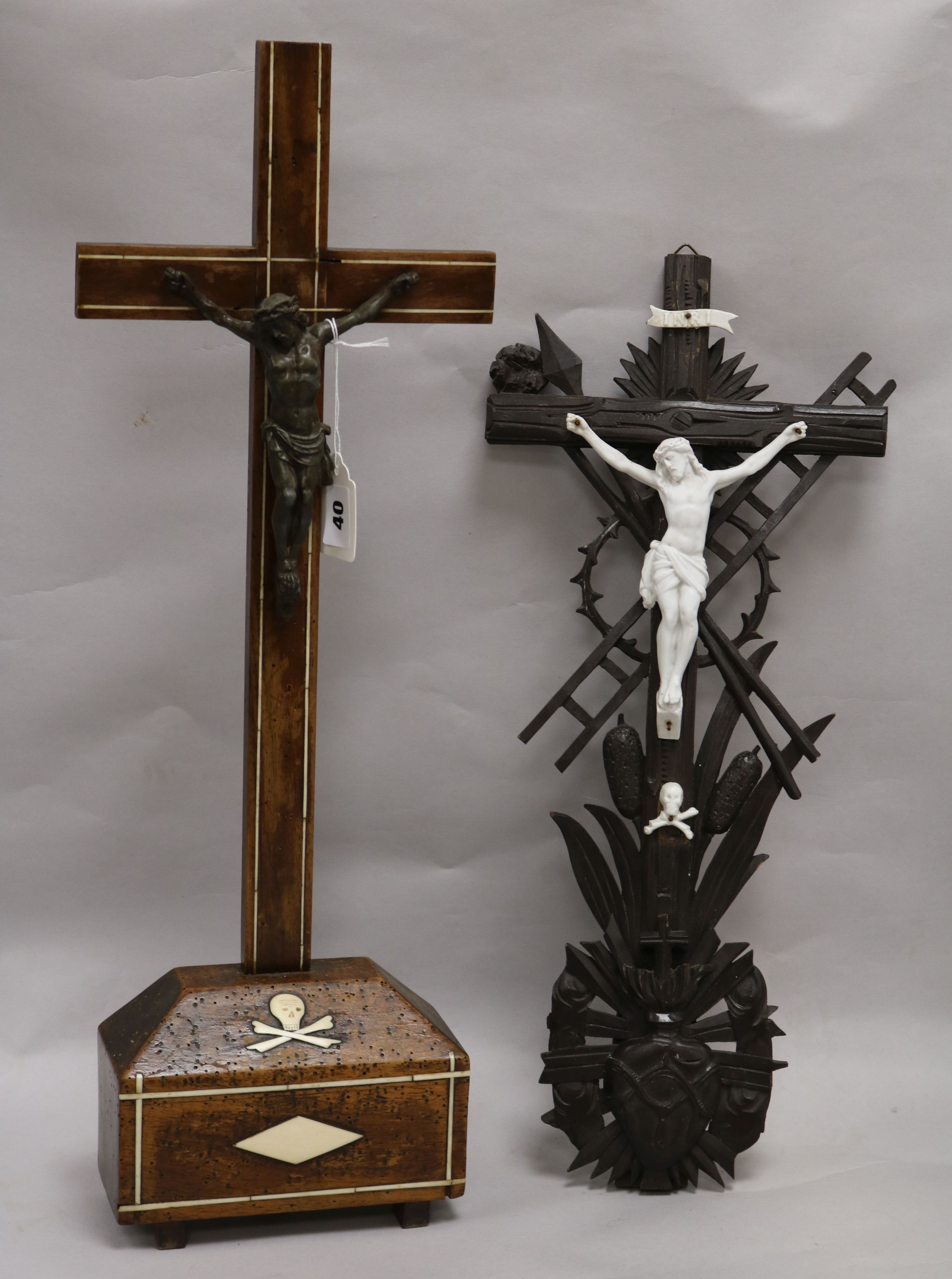 Two Flemish crucifixes largest 61cm.