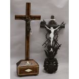 Two Flemish crucifixes largest 61cm.