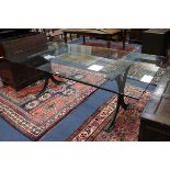A glass top iron base dining table W.215cm