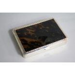 A George V silver and tortoiseshell mounted cigarette box by J. Batson & Son, London, 1917, retailed