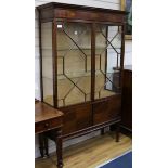 A china display cabinet W.115cm