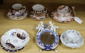 A Dresden floral encrusted cup and saucer, a quantity of Royal Crown Derby teaware and a