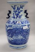 A Chinese blue and white 'lotus' vase H 43cms