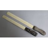 Two silver mounted ivory paper knives, largest 32cm.