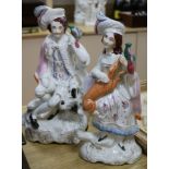 Two 19th century Staffordshire figures of a gentleman and a Lady huntsman (2)