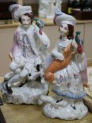 Two 19th century Staffordshire figures of a gentleman and a Lady huntsman (2)