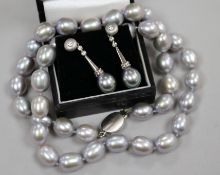 A pair of 18ct gold, diamond and South Sea pearl drop earrings and a South Sea pearl necklace with