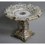 A 19th century white metal and overlaid glass comport, height 17cm.