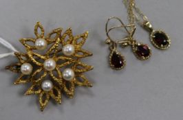 A 1970's textured 9ct gold and cultured pearl brooch and a 9ct gold gem set pendant necklace and