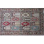 A Persian silk rug 113cm x 70cm