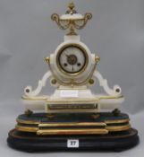 A 19th century French alabaster mantel clock, H.43cm.