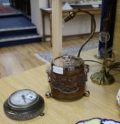A carved biscuit box, 2 lamps and a Cornish stone barometer