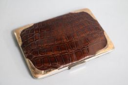 An Edwardian 9ct gold mounted crocodile skin wallet, 14.3cm
