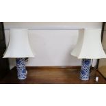 A pair of Chinese blue and white vases, mounted as lamps