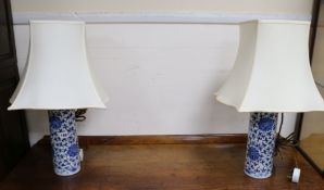 A pair of Chinese blue and white vases, mounted as lamps