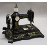 A miniature sewing machine