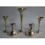 Three silver spill vases including small pair and a pair of silver dwarf candleholders (one af).