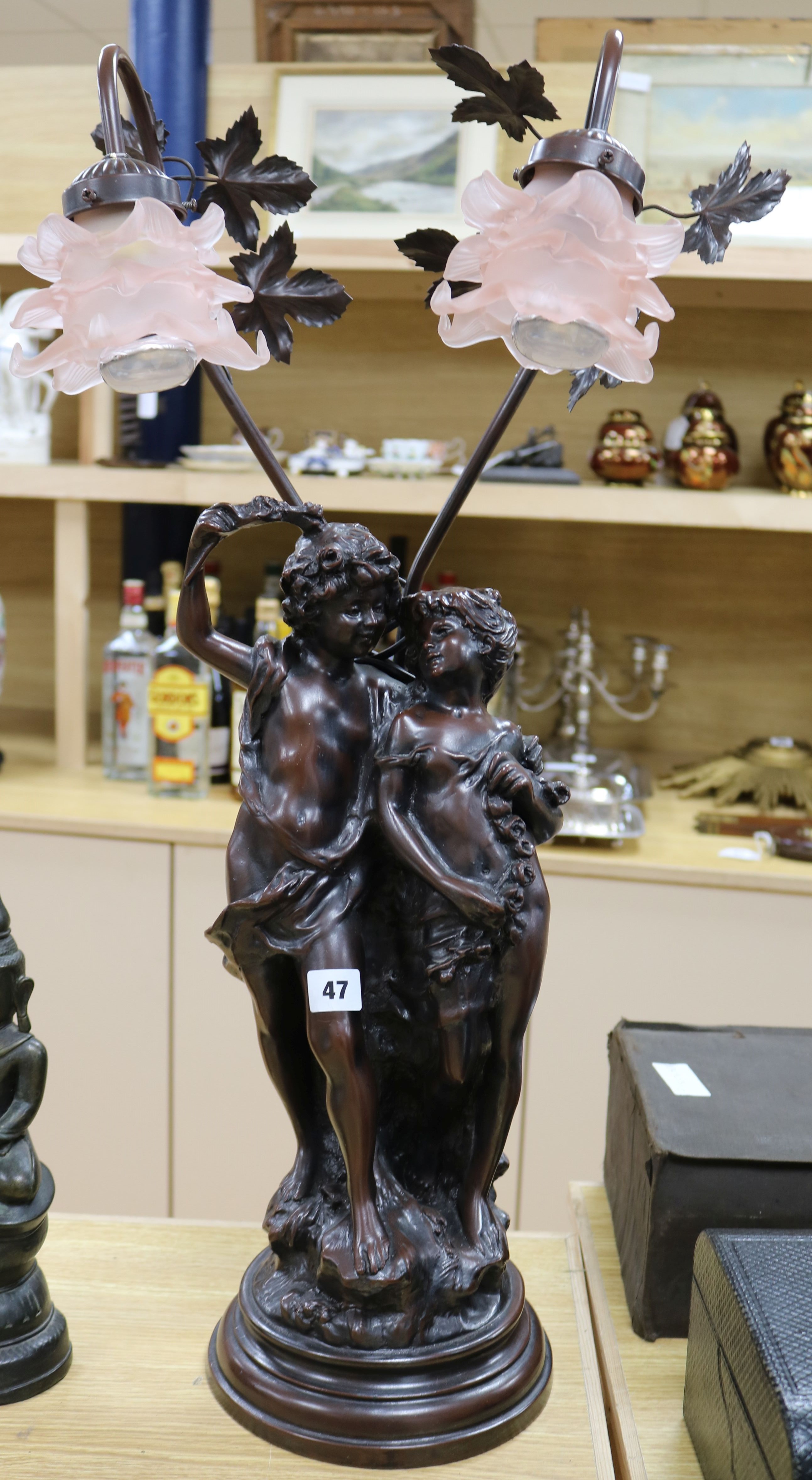 A modern bronze classical figure table lamp