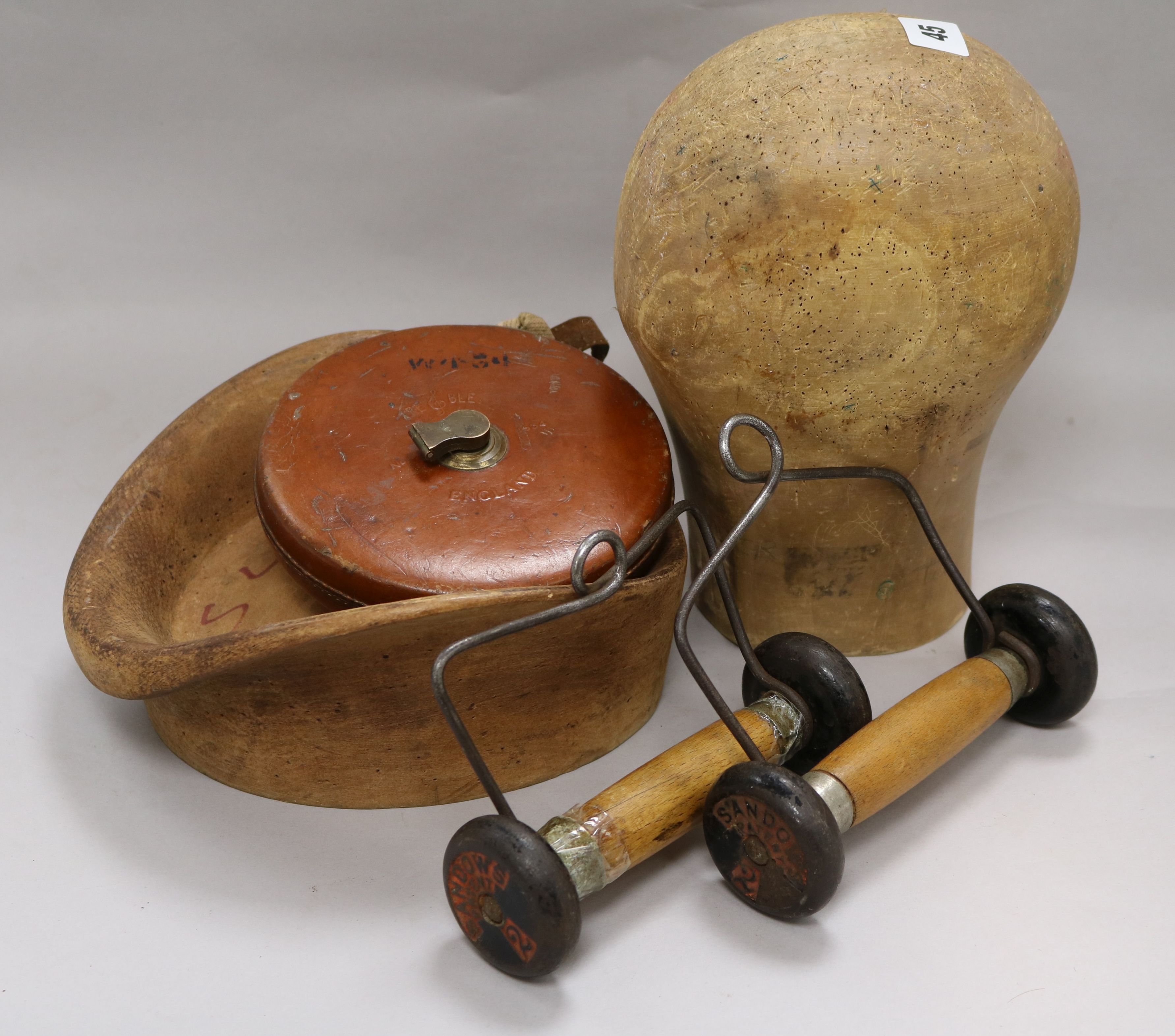 A hat stretcher, measure, hat block, copper vessell etc