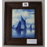 A framed delft tile