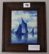 A framed delft tile