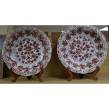 A pair of Chinese Ming-style underglaze copper red dishes, with wooden stands D.44cm