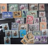 A collection of British, USA and World banknotes and a collection of stamps