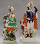 Two 19th century Staffordshire figures, Theatre or Fairground subject H 37.5cms