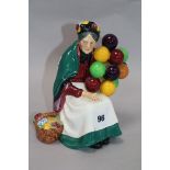 A Royal Doulton model - The Old Balloon Seller, HN1315