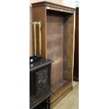 A tall open fronted bookcase W.107cm