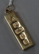 A 1970's 9ct gold ingot pendant, 34mm.