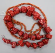 Three assorted coral necklaces.