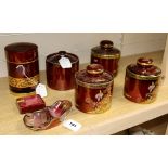 Five Carlton Ware Rouge Royale chinoiserie-decorated tobacco jars (3 Dunhill, 1 a.f), a pipe rack