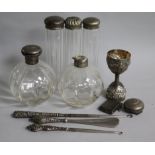 Two silver topped scent bottles, a silver vesta case and other items.