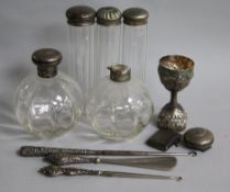 Two silver topped scent bottles, a silver vesta case and other items.
