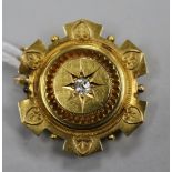 A Victorian 15ct gold and diamond set brooch, 31mm.