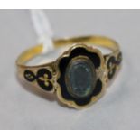 A 19th century gold and black enamel mourning ring, size Q.