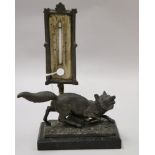 A Victorian bronze fox desk thermometer