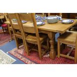 An oak refectory table W.198cm