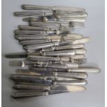 A part matched set of George III silver fruit eaters (11 knives and 12 forks)
