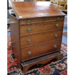 A George III mahogany draughtmans chest of four drawers with rising top and unusual base compartment