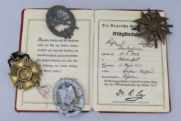 German WWII worker's pass book, Spanish Cross, NSDAP medal, Coasta, Artillary badge, General Assault