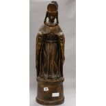 A carved wood figure of a Bishop H 69cms