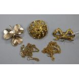 A 9ct gold shamrock brooch, a similar ribbon brooch, two fine chains (one 9ct) and a 14ct gold